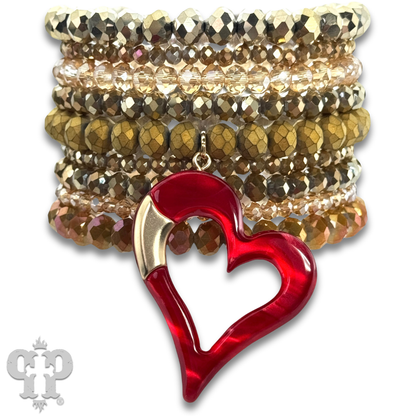 Nine strand bracelet set with red heart charm