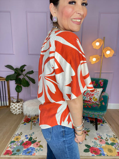 Leaf Print V-Neck Top with a Snap Closure and Trapunto Stitching